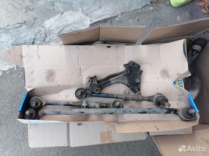 Скоба супорта и рулевая трапеция 2123