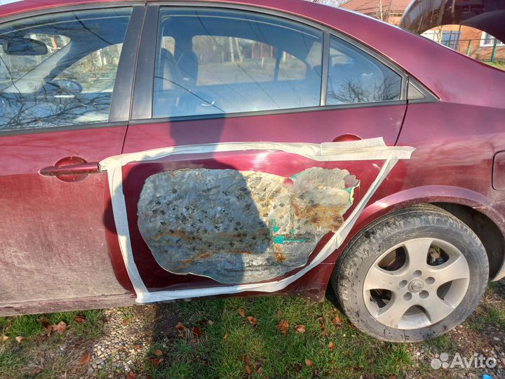 Задняя дверь ниссан примера р12