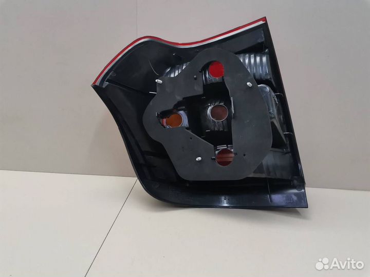 Фонарь задний левый Toyota Corolla Runx E120 2001