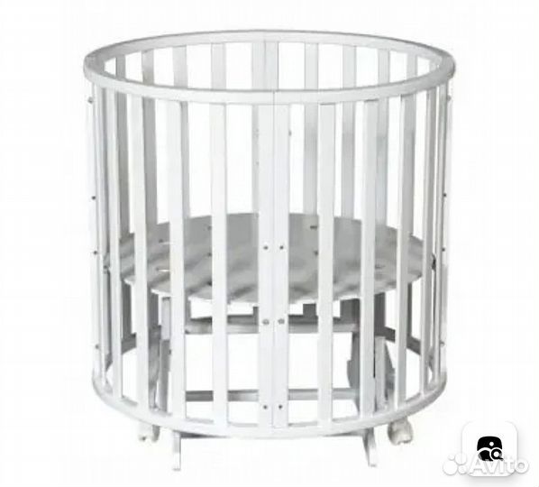 Детская кроватка с маятником