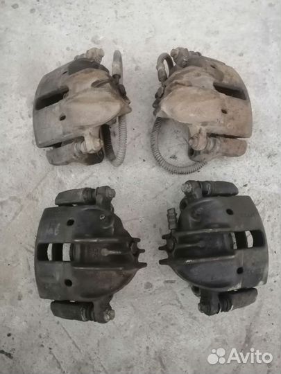 Тормозной суппорт 1.8GDI Митсубиси Каризма