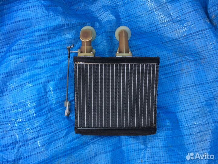 Радиатор печки Nissan Almera N15