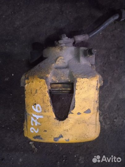 Суппорт тормозной Volkswagen Golf