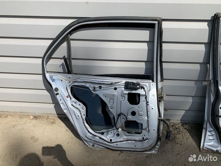 Дверь задняя левая Lancer 9