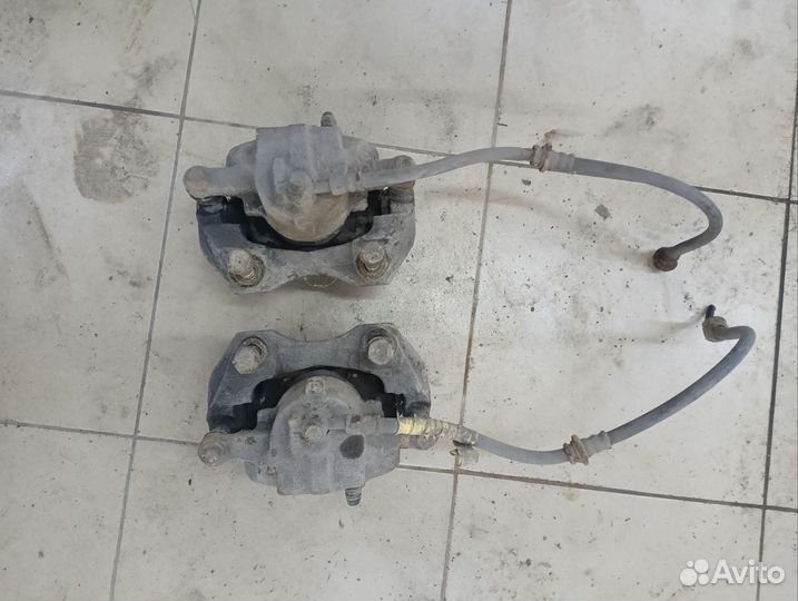 Суппорт тормозной передний nissan almera n16