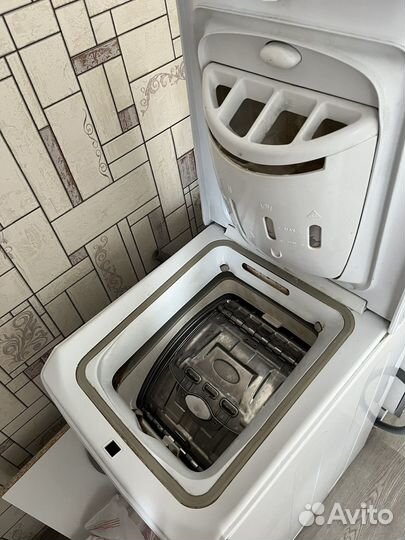 Стиральная машина с вертикальной загрузкой indesit