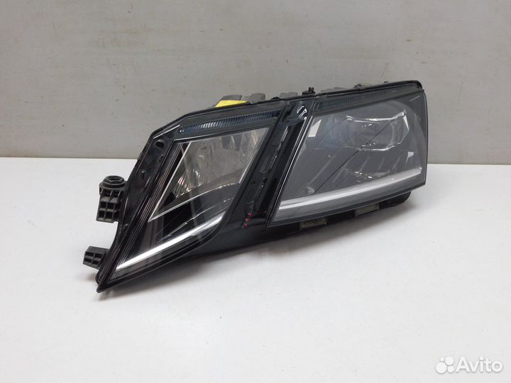 Фара левая Skoda Octavia