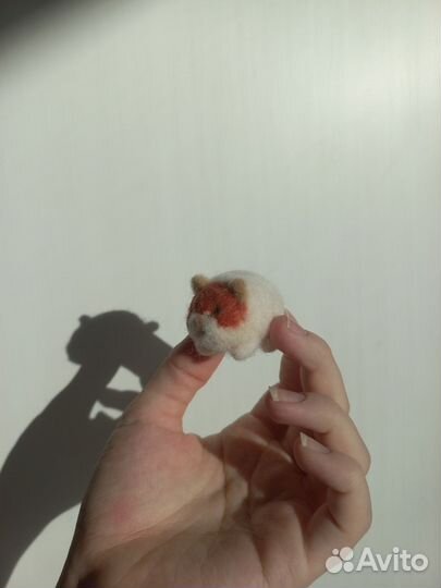 Игрушки из шерсти зайчики