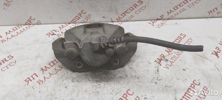 Суппорт тормозной передний правый Mazda 3 Bk седан