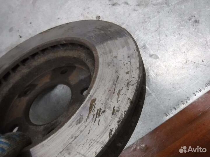 Диск тормозной передний левый Mitsubishi Lancer 10