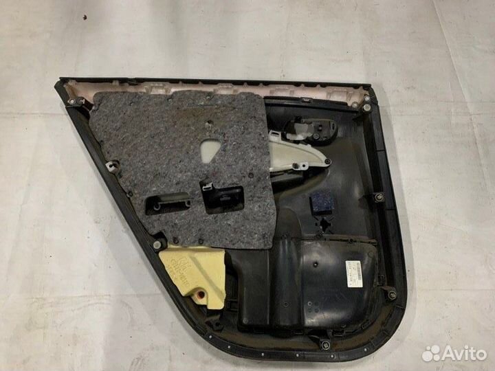 Обшивка двери задняя правая Toyota Corolla 150