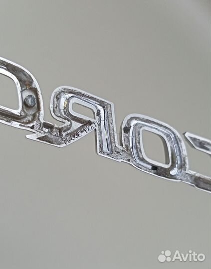 Corolla (12-17) оригинальная эмблема