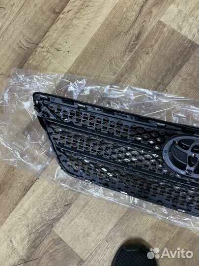 Решетка радиатора Toyota Corolla 120