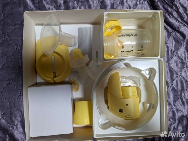 Молокоотсос medela электрический