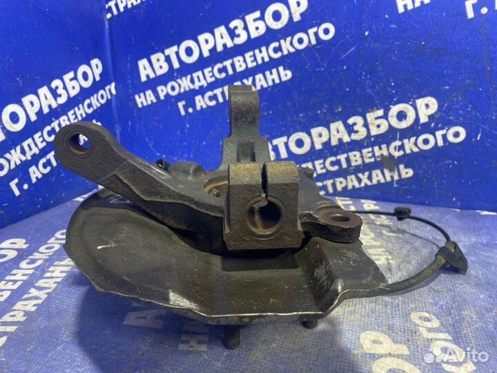 Передний левый поворотный кулак Mitsubishi