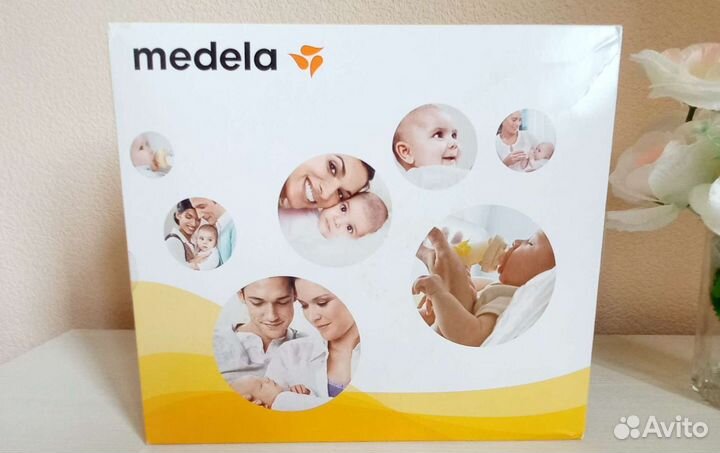 Молокоотсос medela электрический