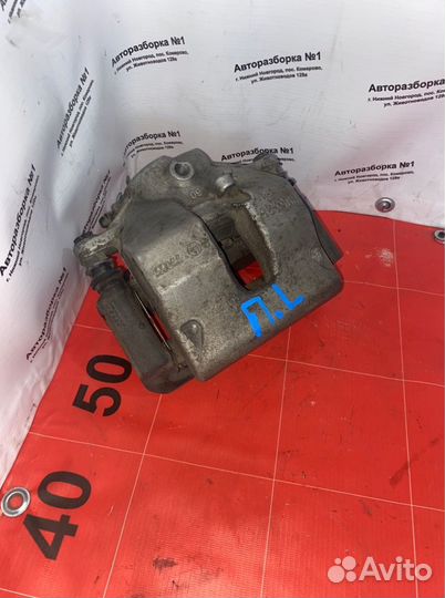 Суппорт тормозной передний левый Mercedes-Benz