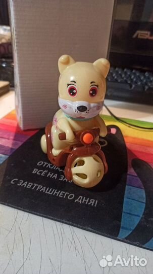 Игрушка от детского корма новая звенит