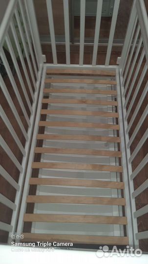 Детская кроватка с маятником и ящиком