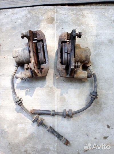 Суппорт тормозной передний Fiat Punto mk1 176 r13