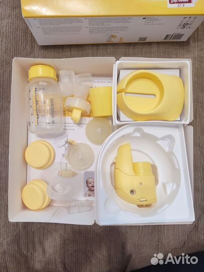 Молокоотсос medela mini электрический
