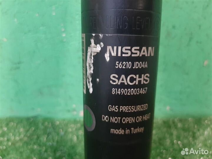 Стойка амортизатора задняя левая Nissan Qashqai J