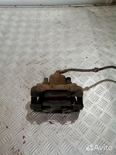 Суппорт тормозной передний правый Opel Astra H L69