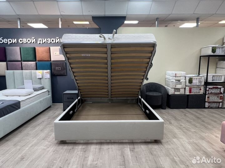 Кровать с подъемным механизмом