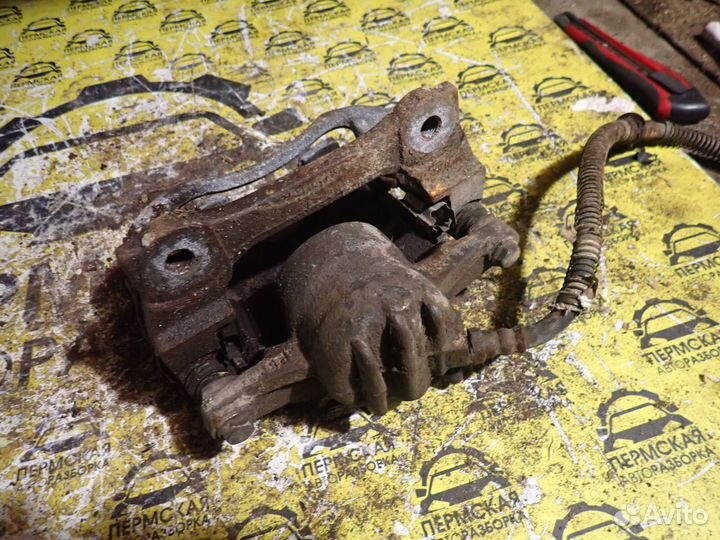 Суппорт тормозной передний левый для Geely emgrand