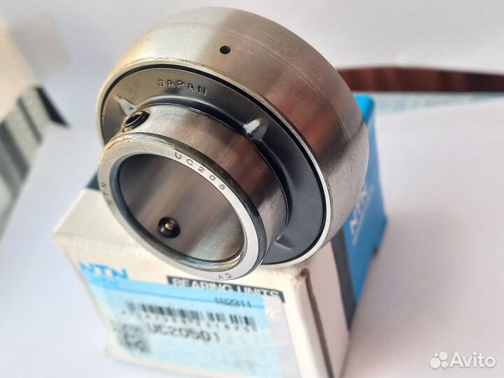 UC205D1 корпусной подшипник NTN Япония оригинал