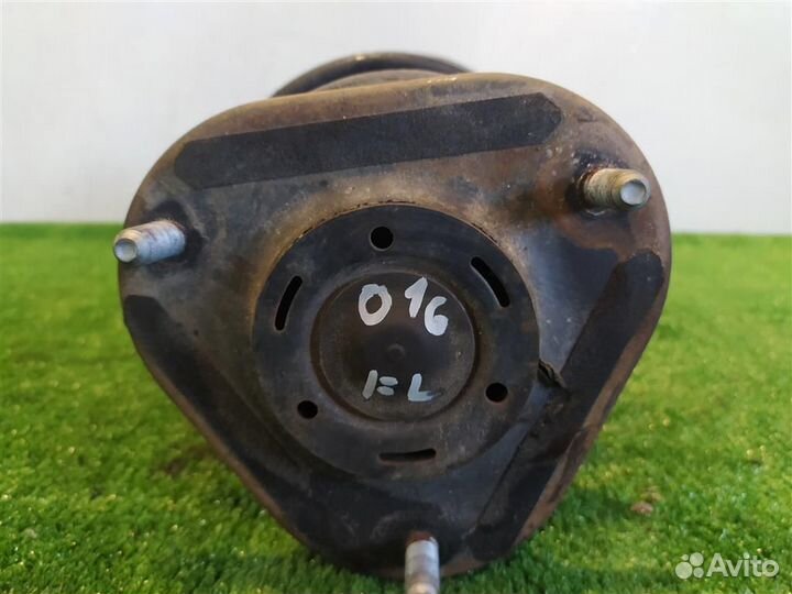 Стойка амортизатора передняя левая Toyota Auris E