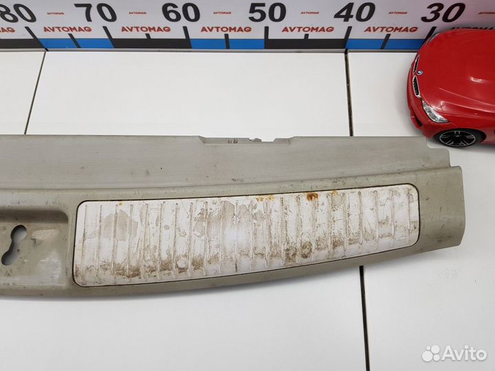 Обшивка багажника на заднюю панель