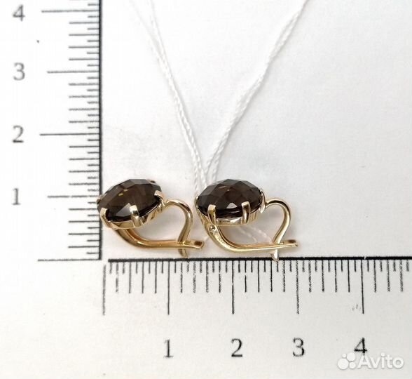 Золотые серьги с камнем