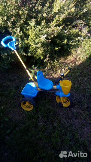 Трехколесный велосипед с ручкой