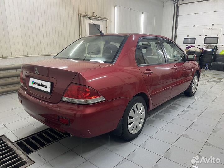 Mitsubishi Lancer 1.6 МТ, 2005, 180 000 км