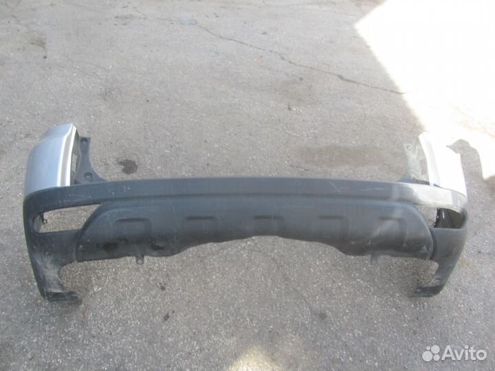 Бампер задний Mitsubishi Pajero Sport 2 6410C655ZZ