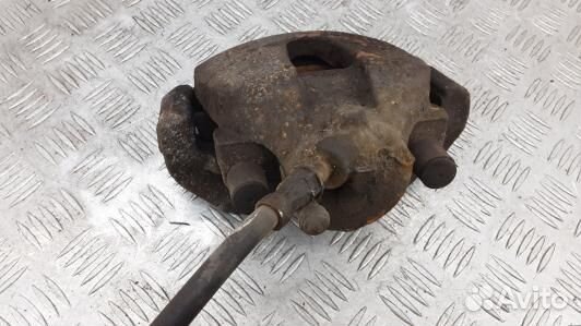 Суппорт тормозной передний левый ford focus 2 (CNI