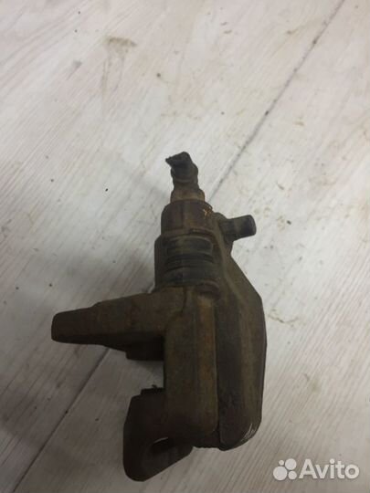 Суппорт задний левый Chevrolet Lacetti седан F14D3