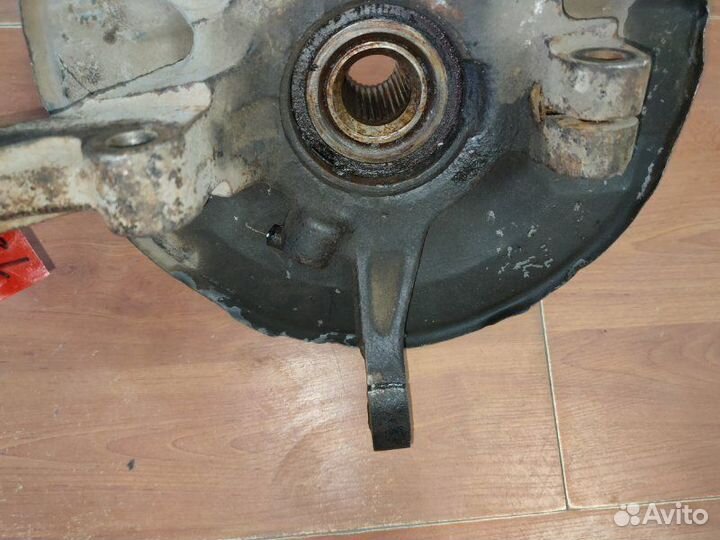 Кулак поворотный передний левый Mitsubishi Lancer