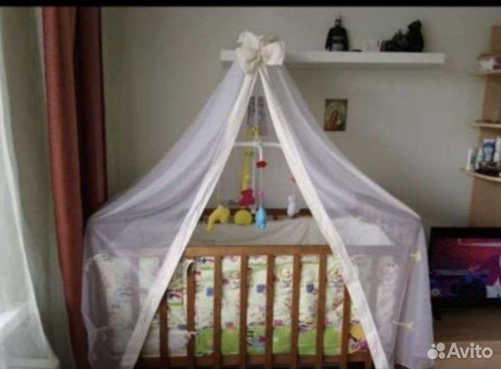 Детская кроватка с поперечным маятником