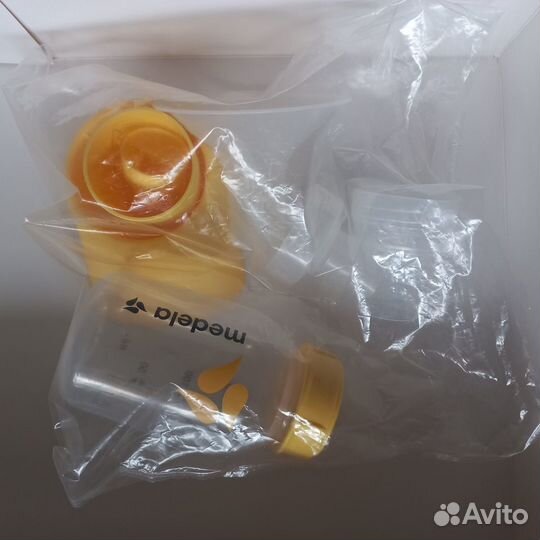 Молокоотсос Medela mini electric