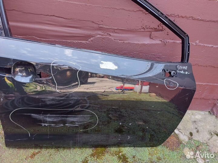 Toyota corolla 210 дверь