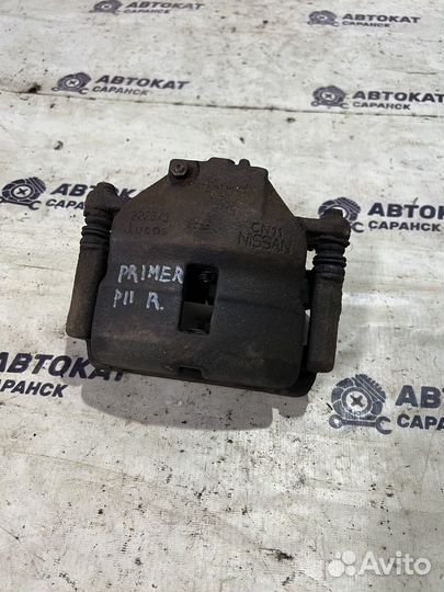 Суппорт передний правый Nissan Primera P11