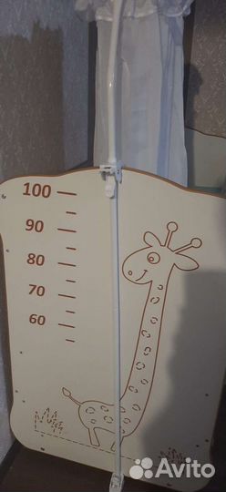 Детская кроватка с маятником