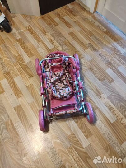 Детская игрушечная коляска