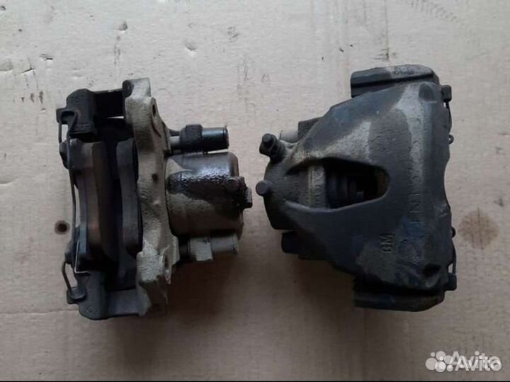 Суппорт тормозной Опель Астра Н