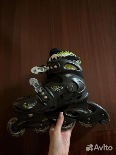 Роликовые коньки