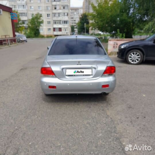 Mitsubishi Lancer 1.6 МТ, 2009, 380 000 км