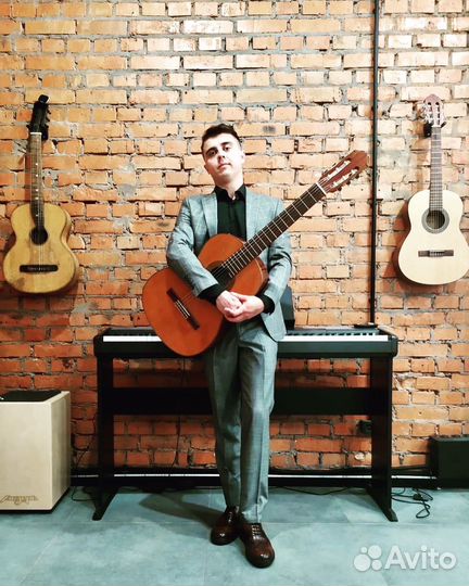 Репетитор по игре на гитаре онлайн