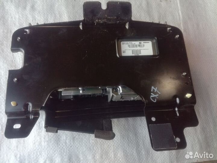 Усилитель магнитолы Мазда CX-7